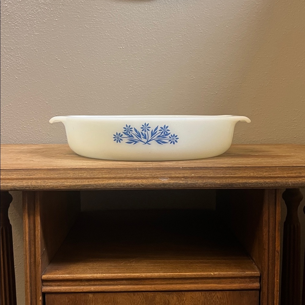 Vintage white casserole dish with blue flowers